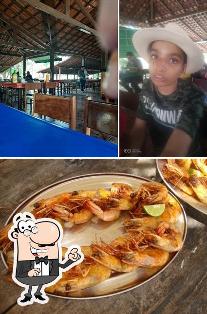 A imagem do Bar e Restaurante Babaçu’s interior e frutos do mar