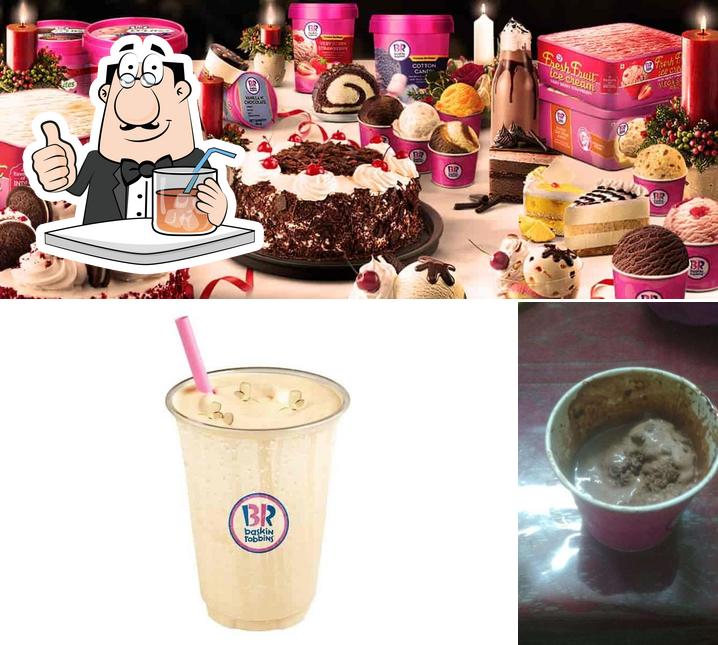 Take a look at the photo showing drink and cake at Baskin Robbins - Ice Cream Desserts