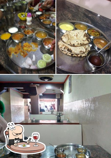 Take a look at the image depicting food and interior at Balaji Bhojanalaya