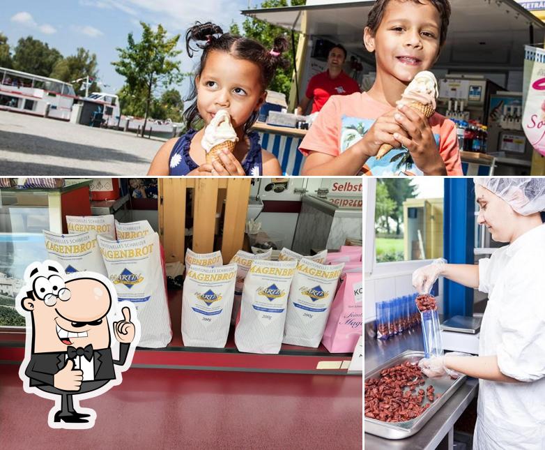 Vedi la foto di Marktfahrer Martin Confiserie - Magenbrot, Softeismaschine, Marronistand, Kundengeschenke, Gebrannte Mandeln, Rahmtäfeli