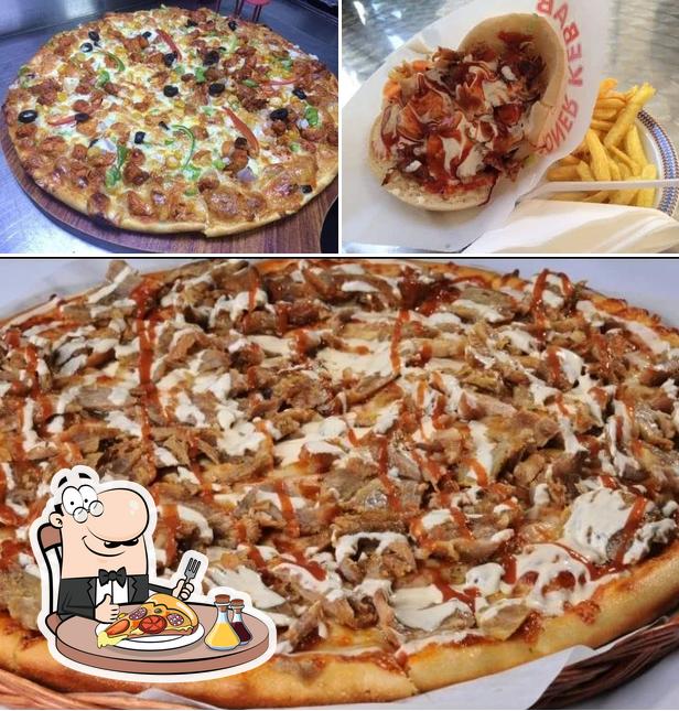 A Food Inn &Pizza Kebab Aviano ( Halal), puoi goderti una bella pizza