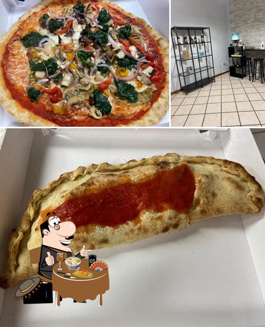 Tra le diverse cose da Bagi pizza 3 si possono trovare la cibo e interni