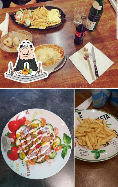 Еда и столики - все это можно увидеть на этом фото из Die Stadtpizzeria