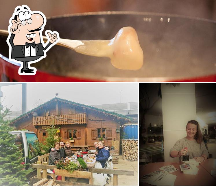 Guarda la foto che raffigura la interni e cibo di Fondue Alp