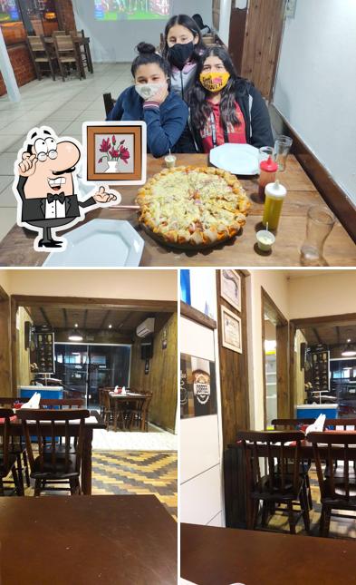 O interior do Point Beer Pizzaria lancheria delivery