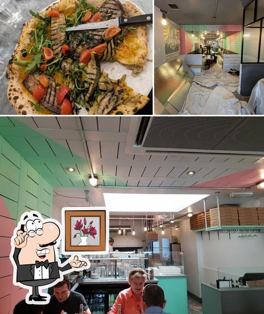 Посмотрите на это фото, где видны внутреннее оформление и еда в Santa Maria Pizzeria Fitzrovia