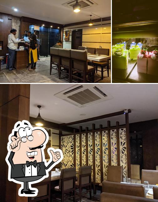 This is the picture displaying interior and cake at Supriyanka Restaurant