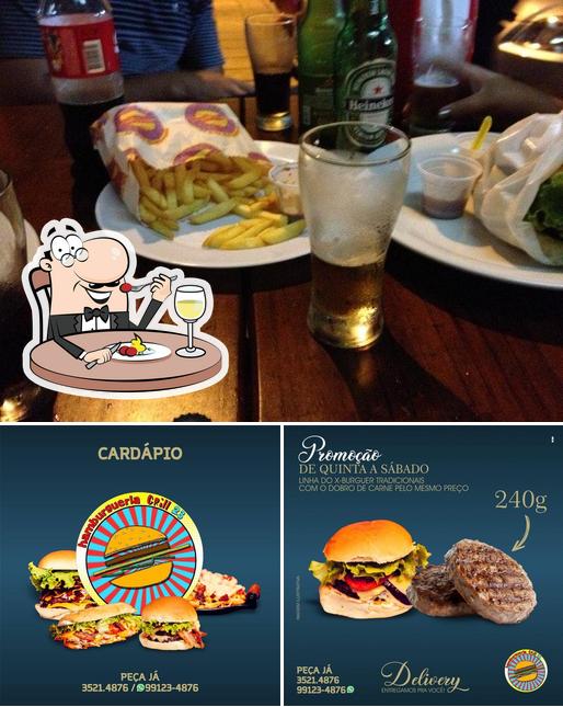 Dê uma olhada a imagem ilustrando comida e cerveja no Hamburgueria Grill 23