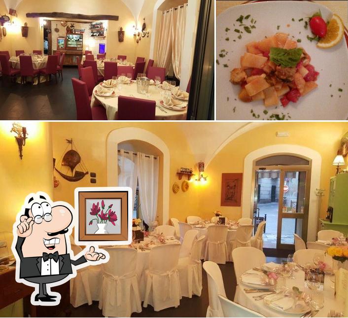 Dai un’occhiata alla foto che mostra la interni e cibo di La Locanda di Mimì