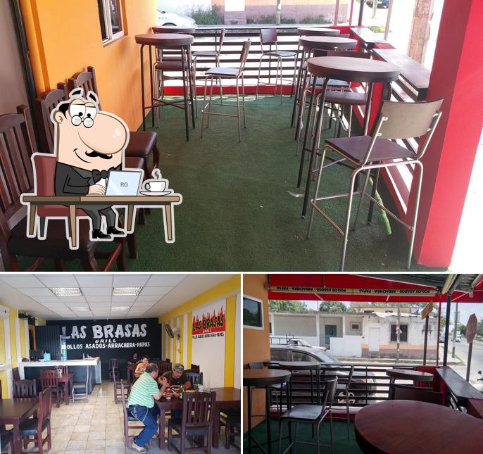 Take a seat at one of the tables at Pollos Las Brasas, sucursal Las Torres