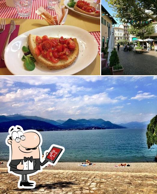 Ristorante Centrale si caratterizza per la esterno e tavolo da pranzo
