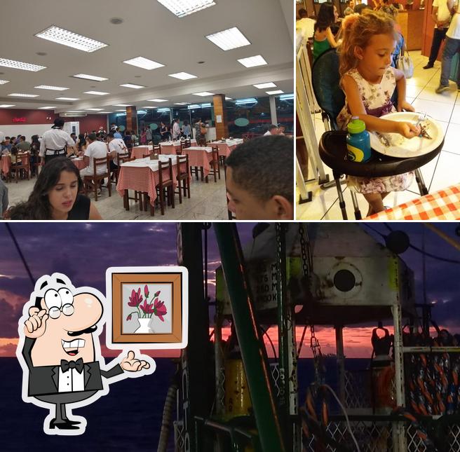 Dê uma olhada a foto ilustrando interior e exterior no Pizzaria Fogarelle