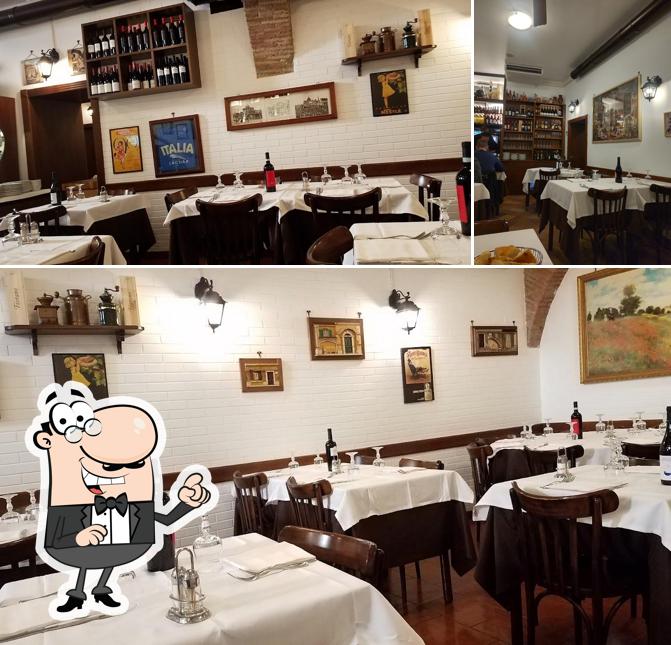 La foto di interni e tavolo da pranzo da Alessio