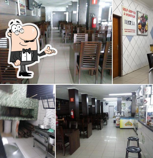 O interior do Restaurante & Pizzaria Imigrantes