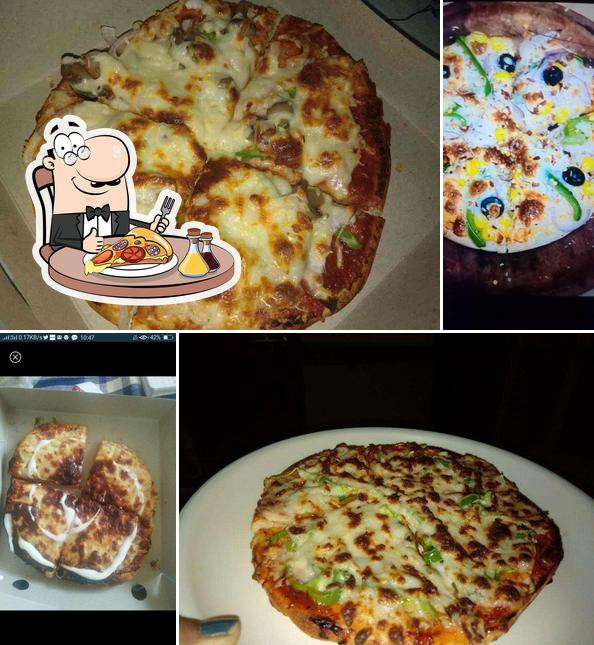 Pick pizza at Kesariya Softy and Softy