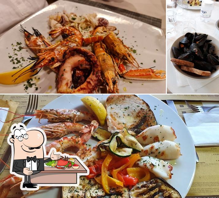 Essayez des fruits de mer à Ristorante Casa di Caccia