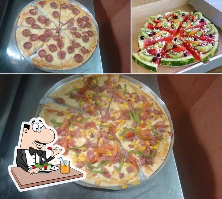 Comida em Pizzaria Ti Ti Ti