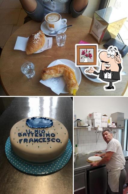 Questa è la foto che mostra la interni e tavolo da pranzo di Pasticceria Santa Rita