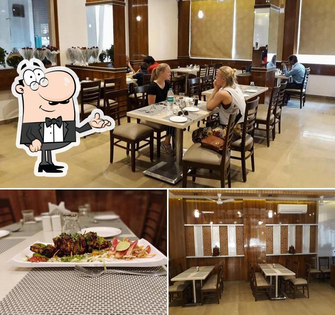 Among different things one can find interior and food at Hotel MintLeaf MultiCuisine Restaurant