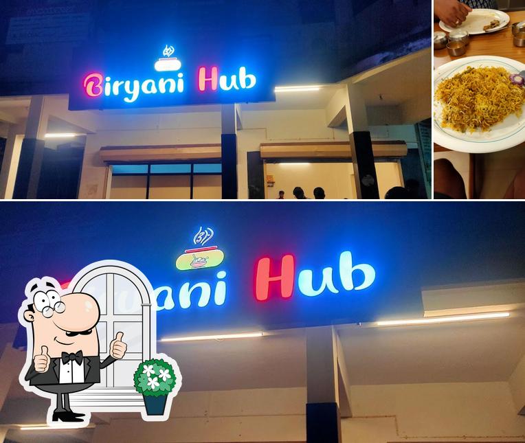 The image of exterior and food at Biryani Hub