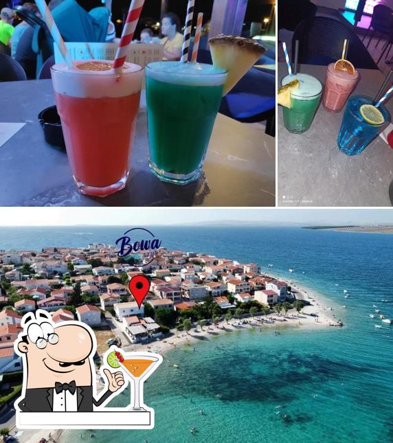 Guarda la foto che mostra la bevanda e esterno di Bowa Beach Bar Vir