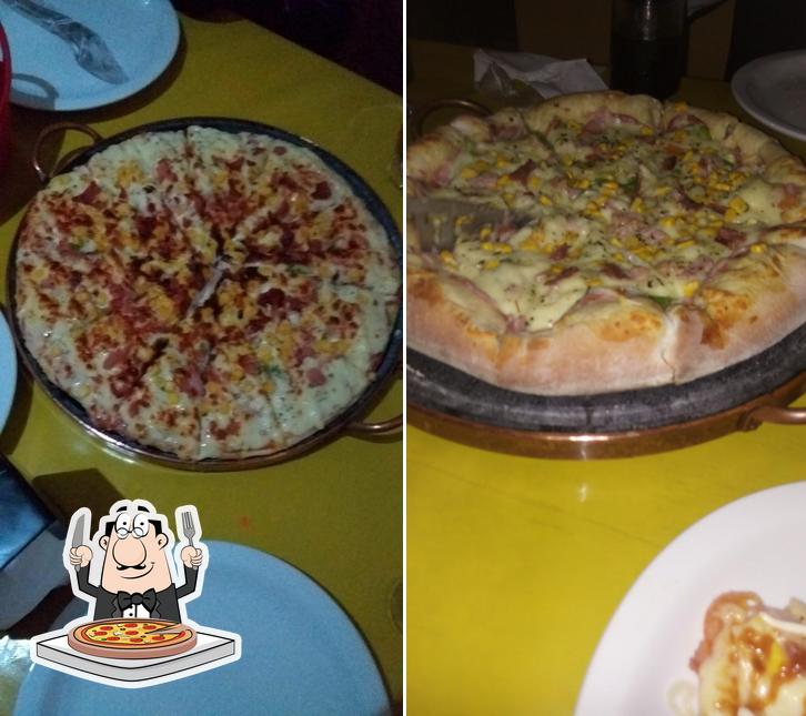 Experimente pizza no Kennedy's Bar