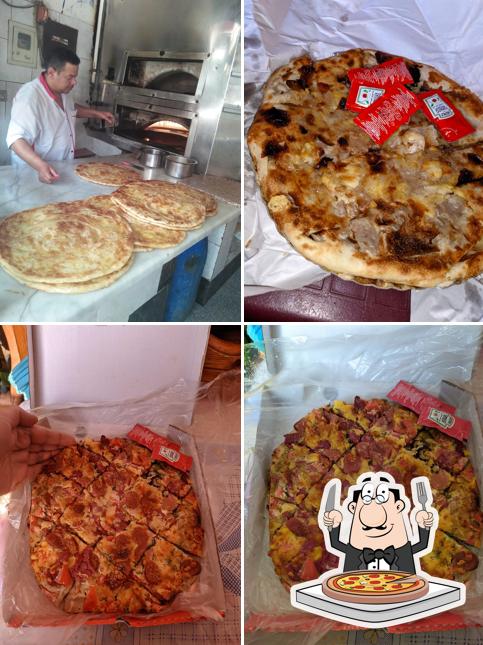 Prueba una pizza en بيتزا فطائر كريب العميد