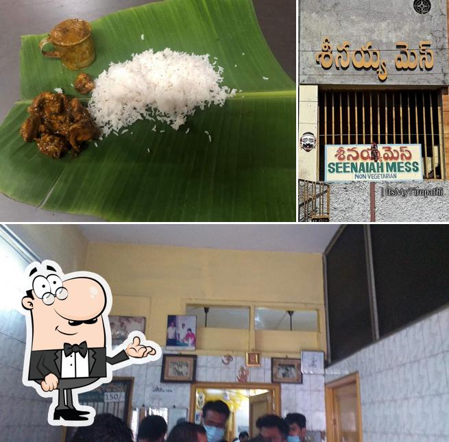 The photo of interior and burger at Seenayya Mess