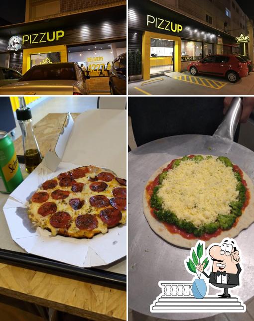 A imagem do Pandafit Pizzup’s exterior e comida