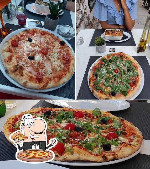 Scegli una pizza a Restoran & Pizzeria The bar