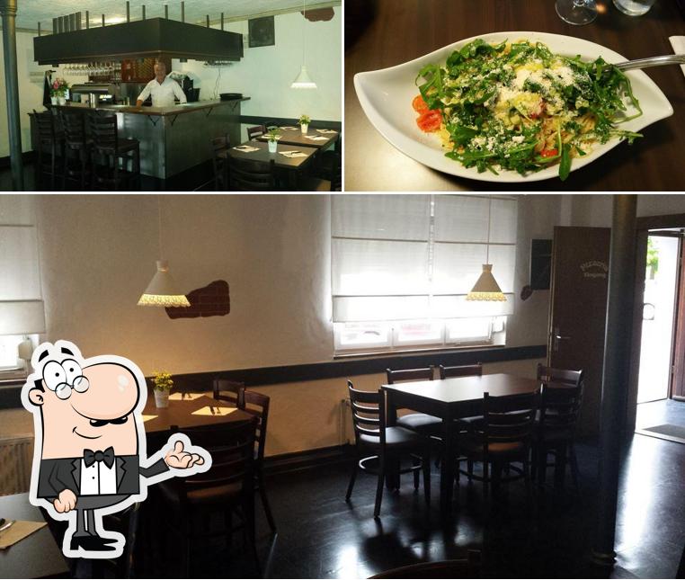 Las imágenes de interior y comida en Pizzeria Löwen
