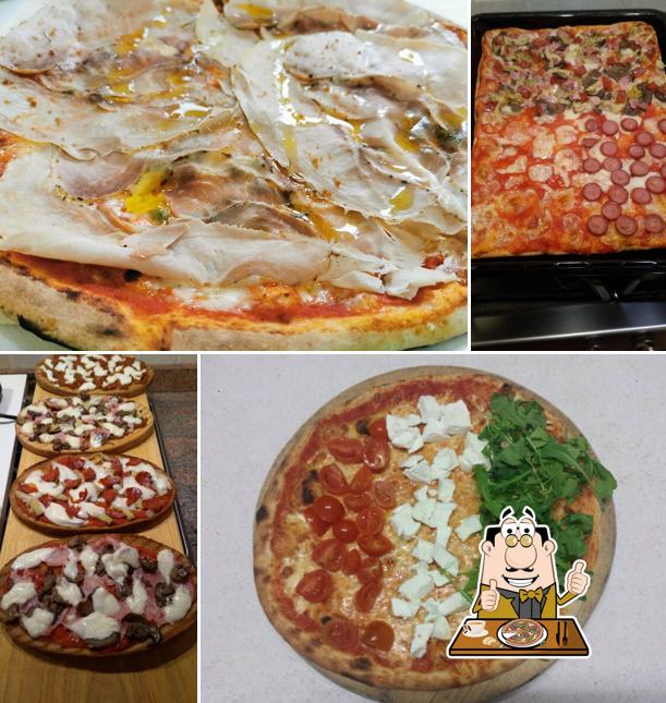 A Pizzeria Trattoria Alla Croce, puoi ordinare una bella pizza
