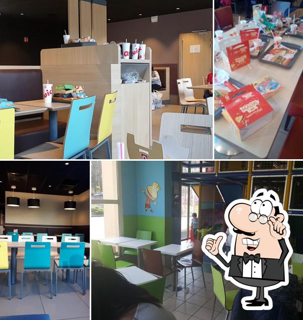 Installez-vous à l'une des tables de Quick Mulhouse Dornach