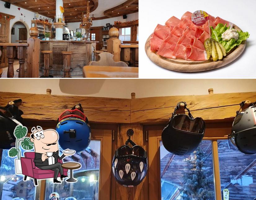 Questa è la foto che mostra la interni e la carne di Apres Ski Bar Sadla