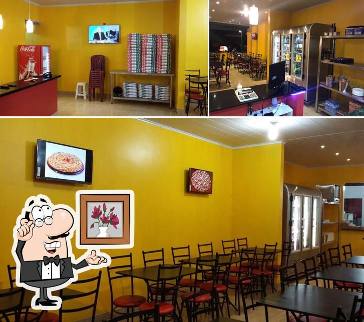 Veja imagens do interior do La pizza Setor O