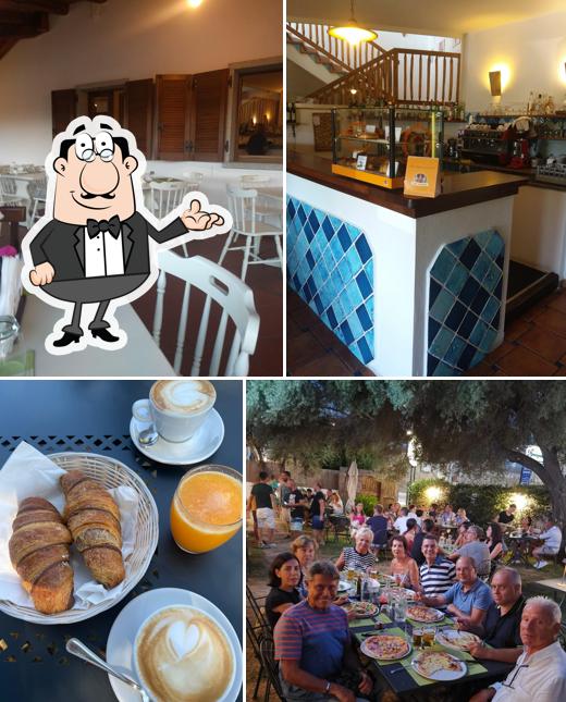 Dai un'occhiata agli interni di Pizzeria Ristorante Caminera