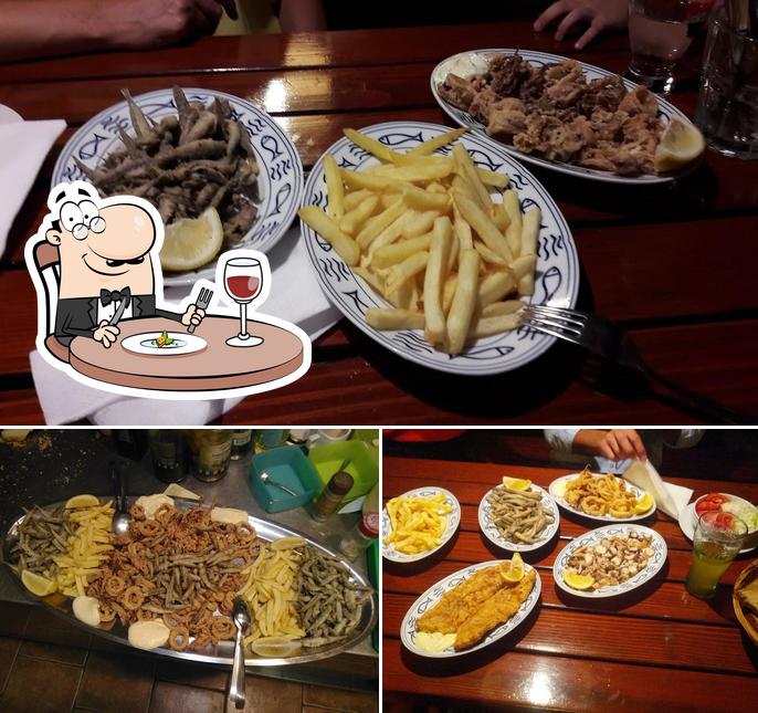 La foto della cibo e tavolo da pranzo di Konoba Kormilo