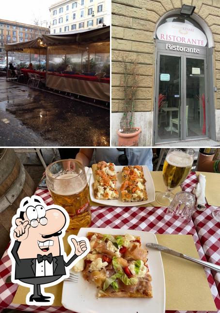 La immagine della interni e cibo di Bar Giulio Cesare Roma