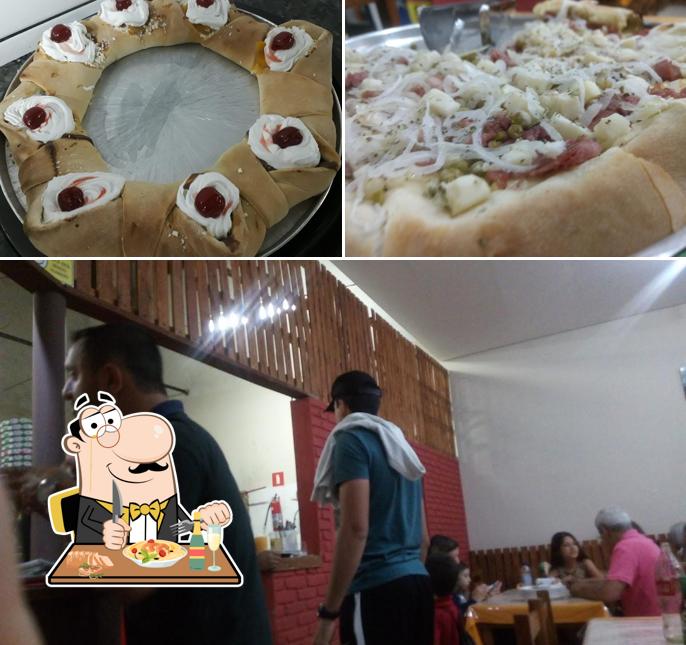 Entre diversos coisas, comida e interior podem ser encontrados a Casa do Forno Pizzaria Santa Rita