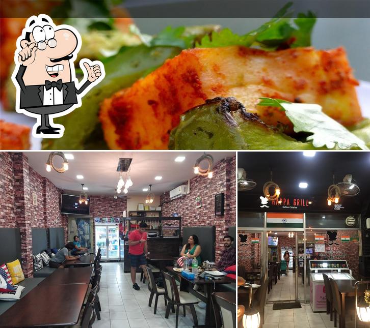 Las imágenes de interior y pizza en Happa Grill
