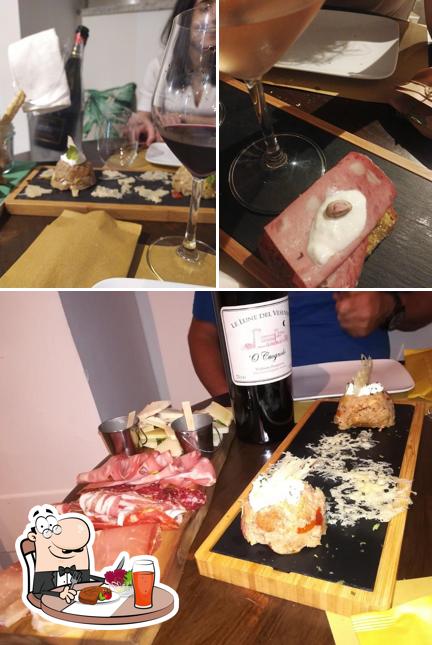 La foto di tavolo da pranzo e la carne da Stappami Wineroom