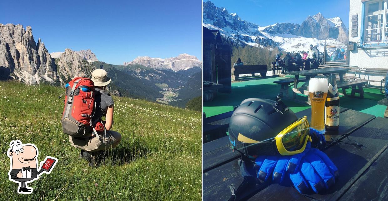 Puoi goderti l'aria fresca da seduto all'esterno di Rifugio Ciampedie