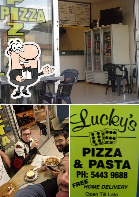 Look at this image of Lucky's Dial-A-Pizza