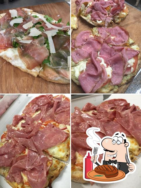 Prenditi i piatti di carne a Pizzeria Pizza Out