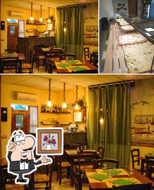 Questa è la foto che raffigura la interni e pizza di Panificio Pizzeria San Prospero - Antico Forno Vitali