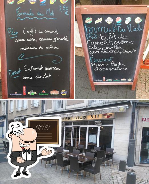 Among various things one can find blackboard and interior at Le Louis XII • Bar Restaurant