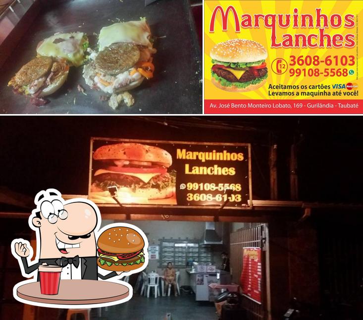 Get a burger at Marquinhos Lanches Chapa Quente