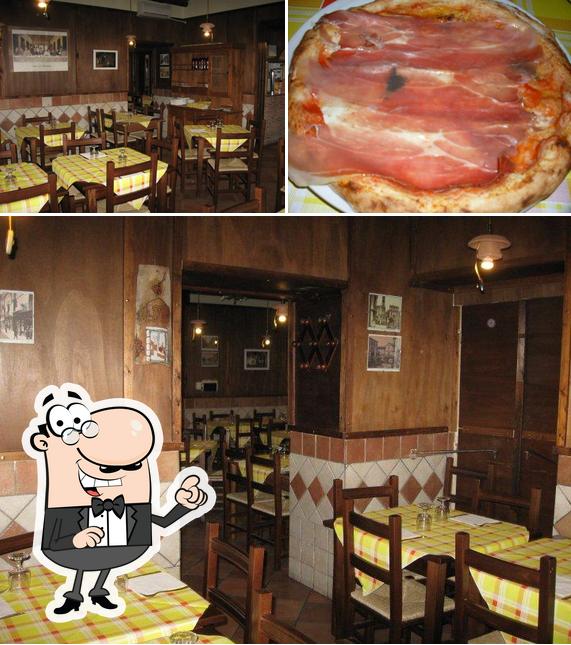 La immagine di interni e la carne da Pizzeria Il Ritrovo