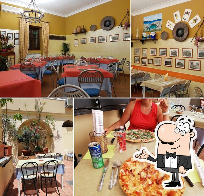 Siediti a un tavolo di La Campagnola Trattoria - Pizzeria