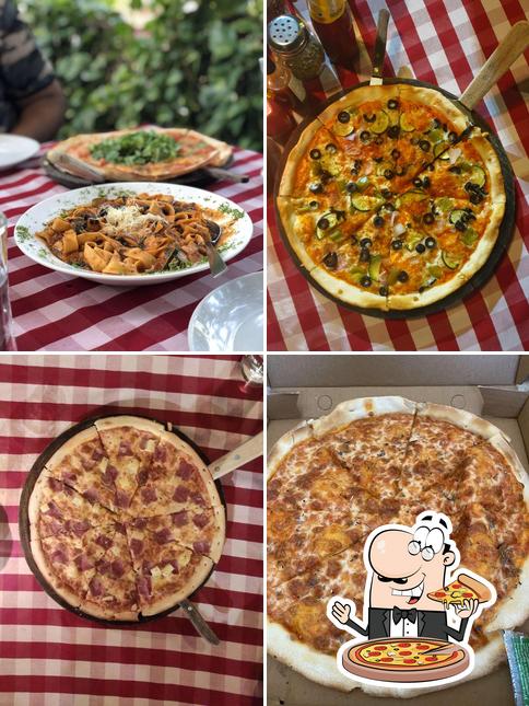Try out pizza at Tuscany Gardens Candolim